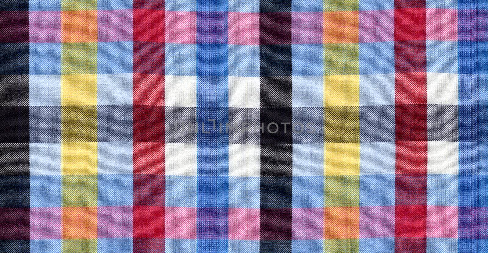 Blue, red, black and yellow square fabric pattern background 