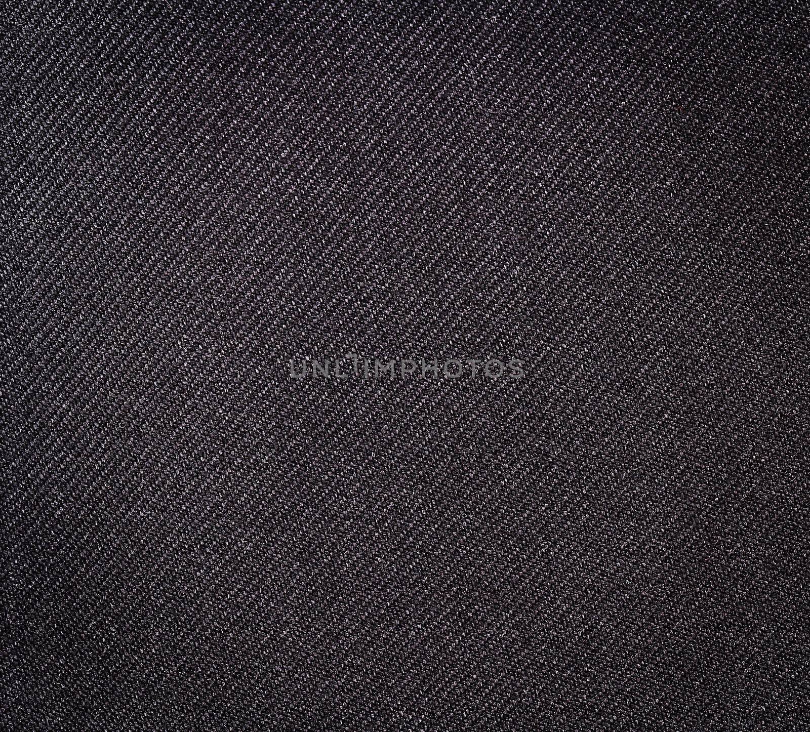 Black fabric texture. Clothes background. Close up