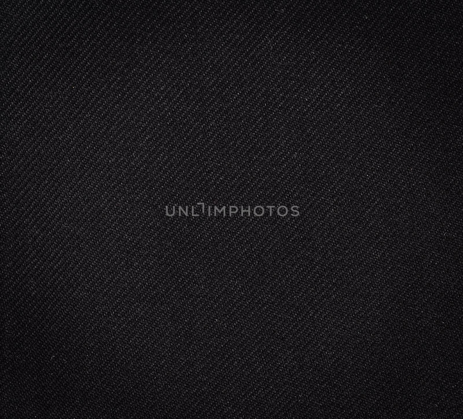 Black fabric texture. Clothes background. Close up