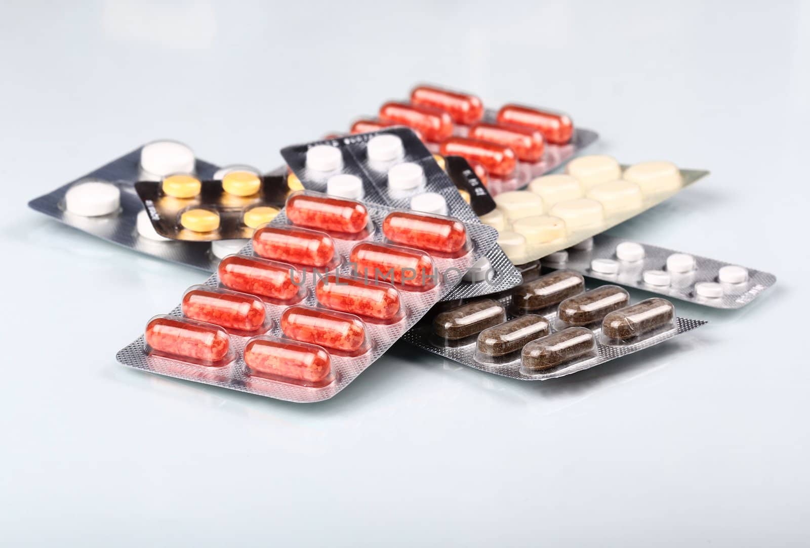 Packs of pills and tablets. Medical background