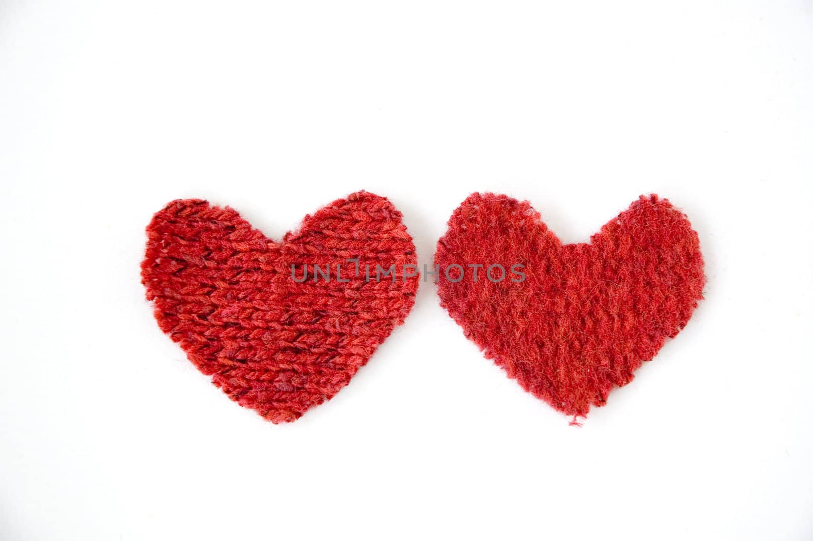 two red hearts on white background