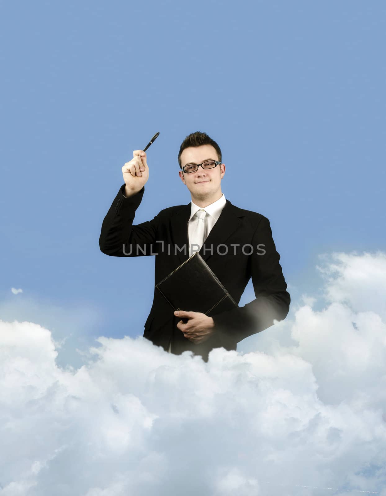Businessman sitting on clouds proving that the sky is the limit of Business