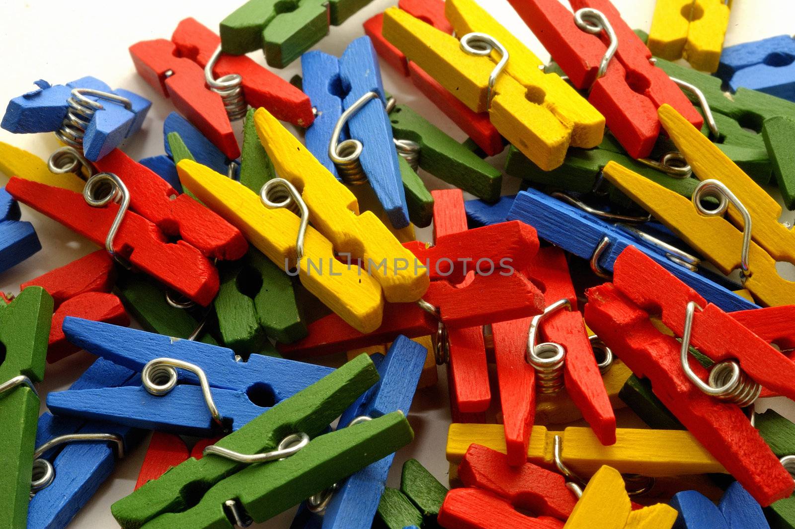 small clothes pegs of colors