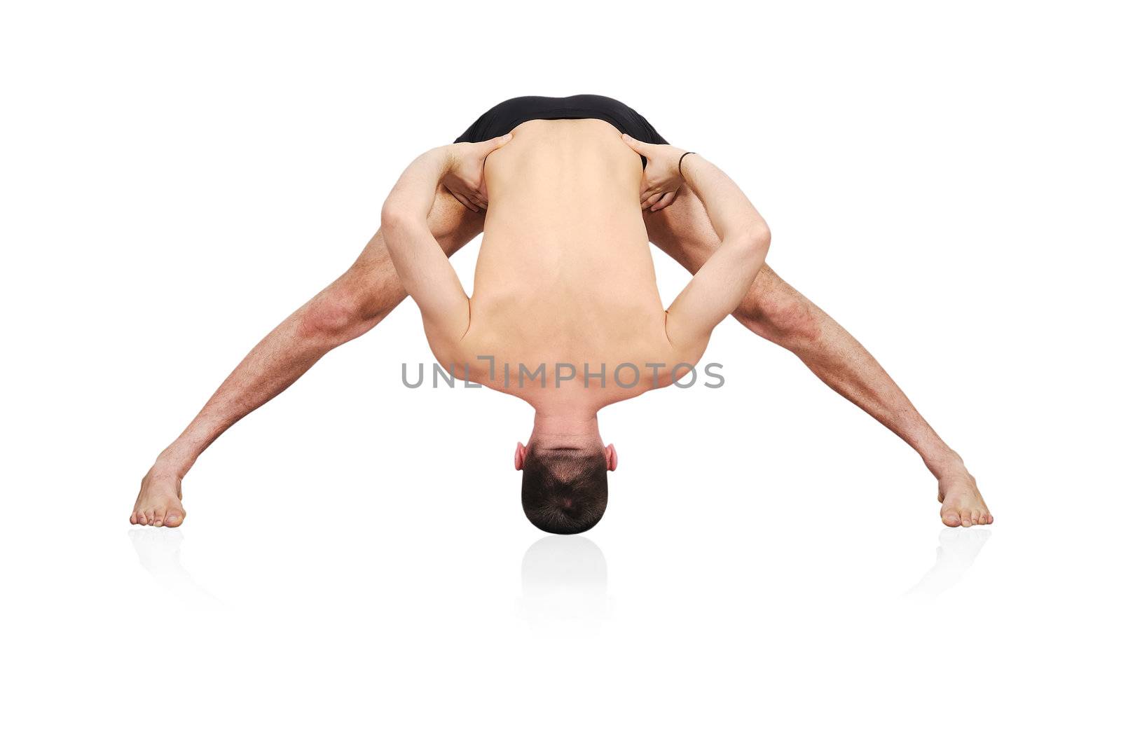 guru practicing yoga in position