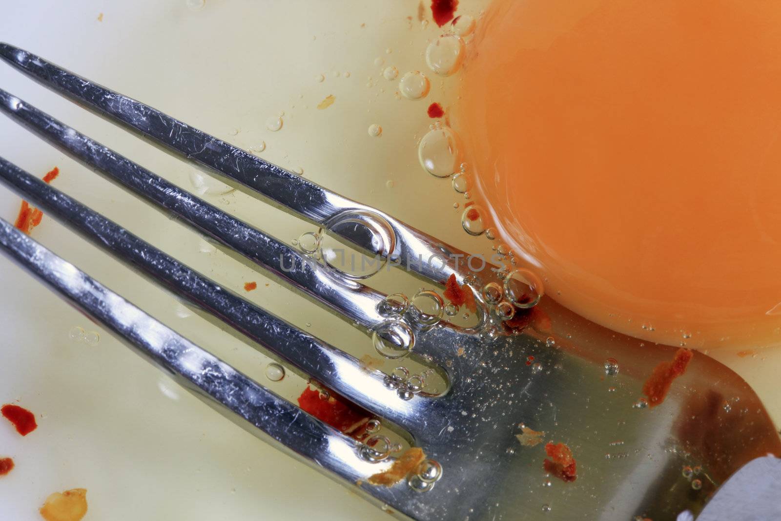 The image of a plug and broken egg