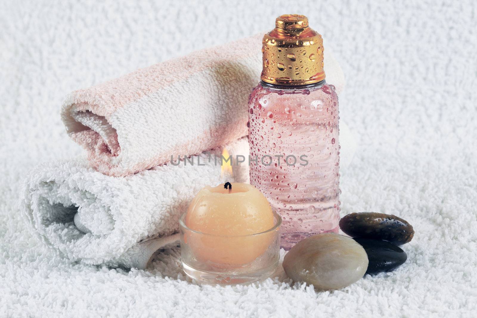 Accessories for a bath with candles and stone