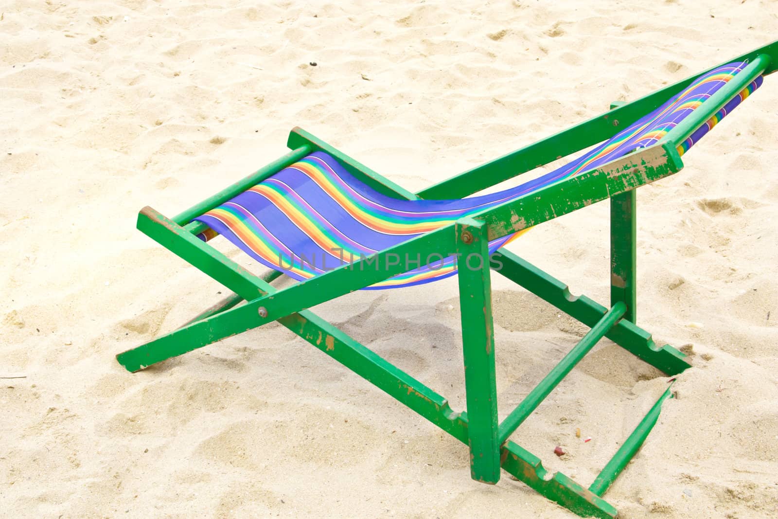 Folding chair  at the beach of the sea.