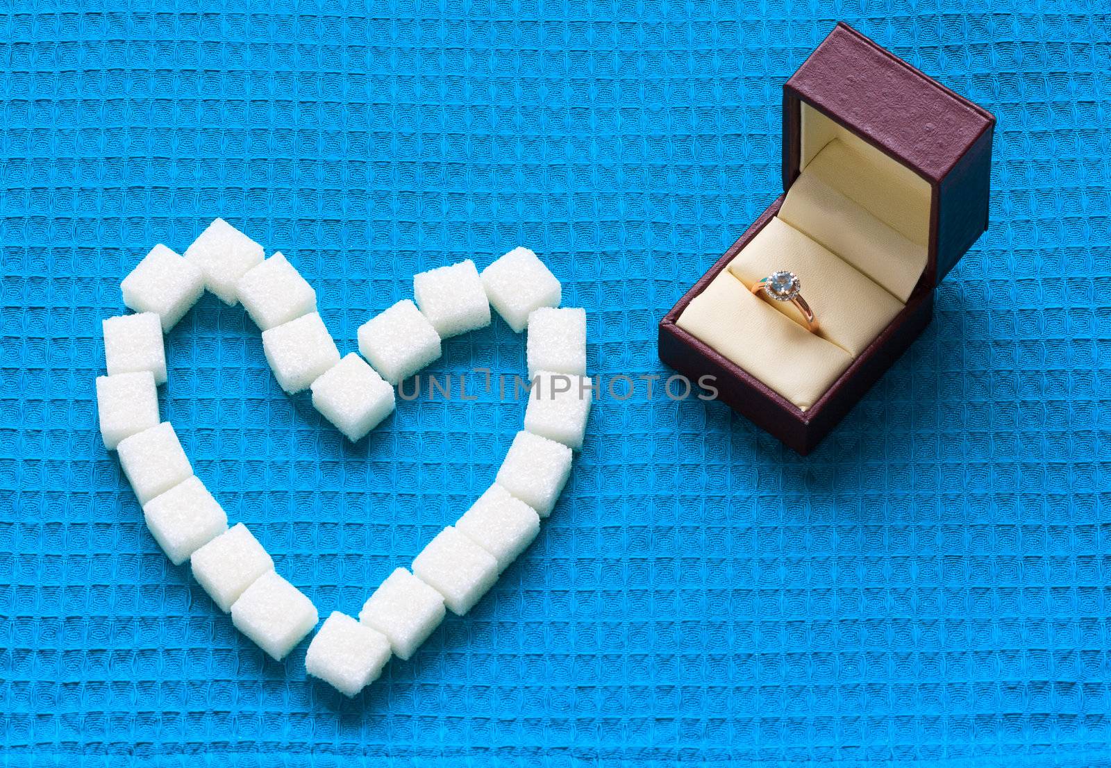 engagement ring and sugar hearts