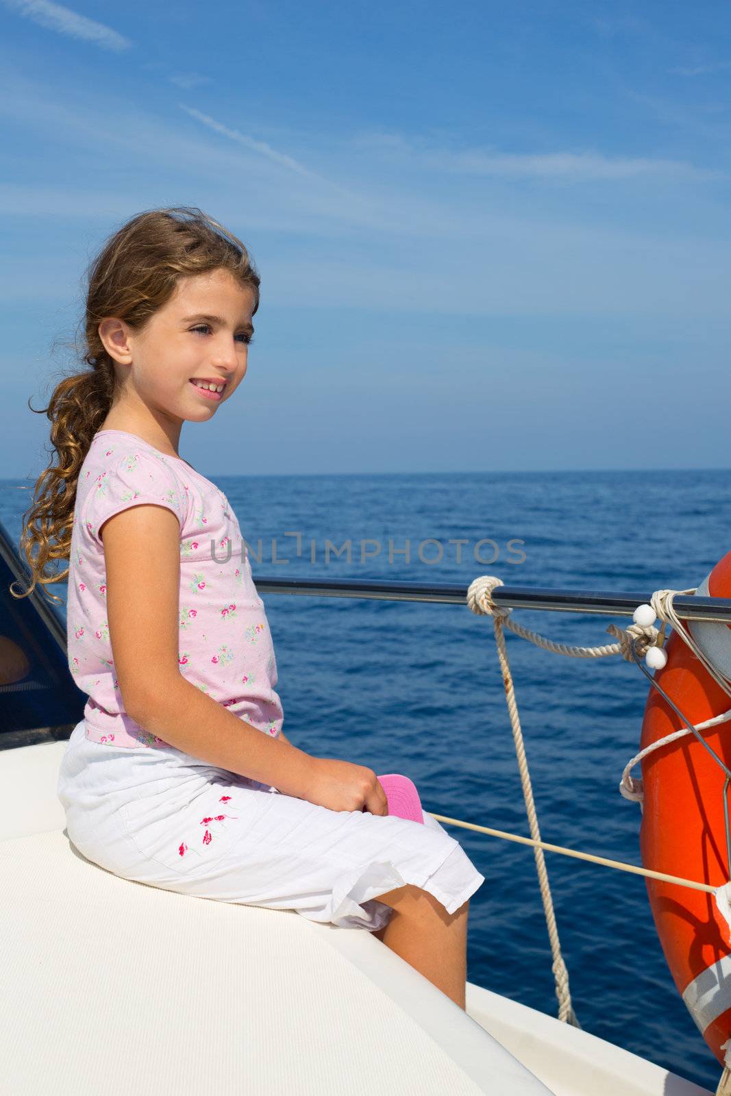 child happy girl sailing happy boat by lunamarina