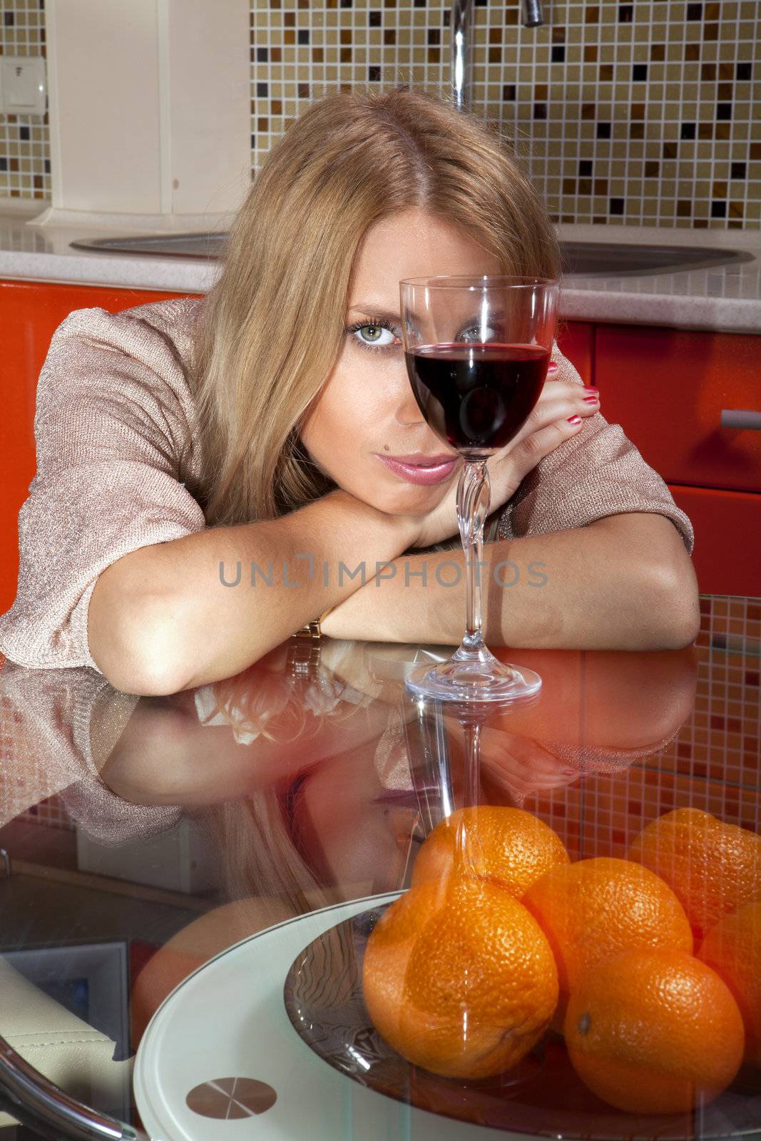 woman in shine dress with glass of wine by ssuaphoto