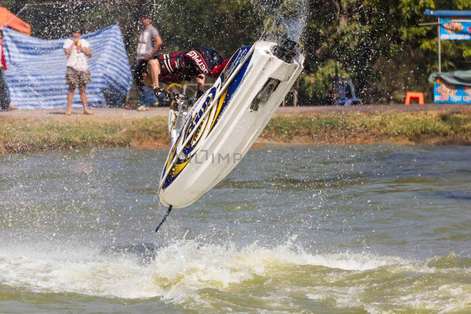 SARABURI THAILAND-JANUARY 20: Sonswut Rappasubpisan in action during show Freestyle the Jet ski  stunt action  on Jan 20, 2013 in SARABURI,Thailand.