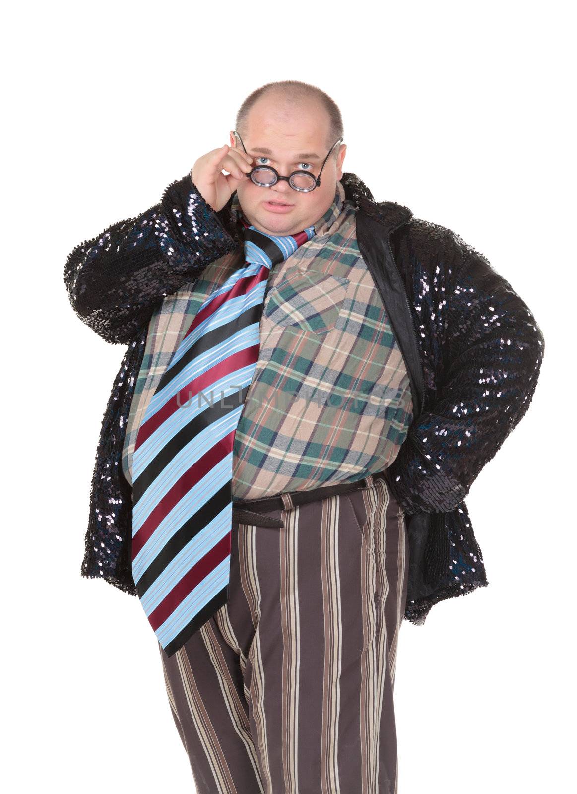 Fun portrait of an obese man with an outrageous fashion sense wearing a mixture of stripes, checks and spangles topped by an oversized flamboyant tie, on white