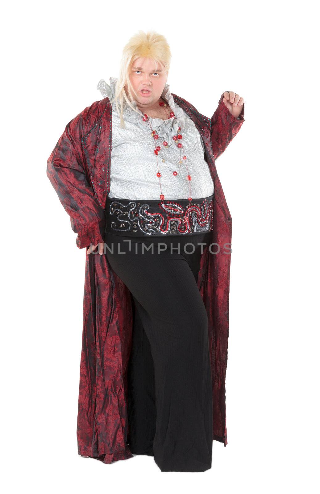 Overweight entertainer or disillusioned drag queen with a cheap blonde wig and flowing robe over long a black skirt, humorous portrait on a white