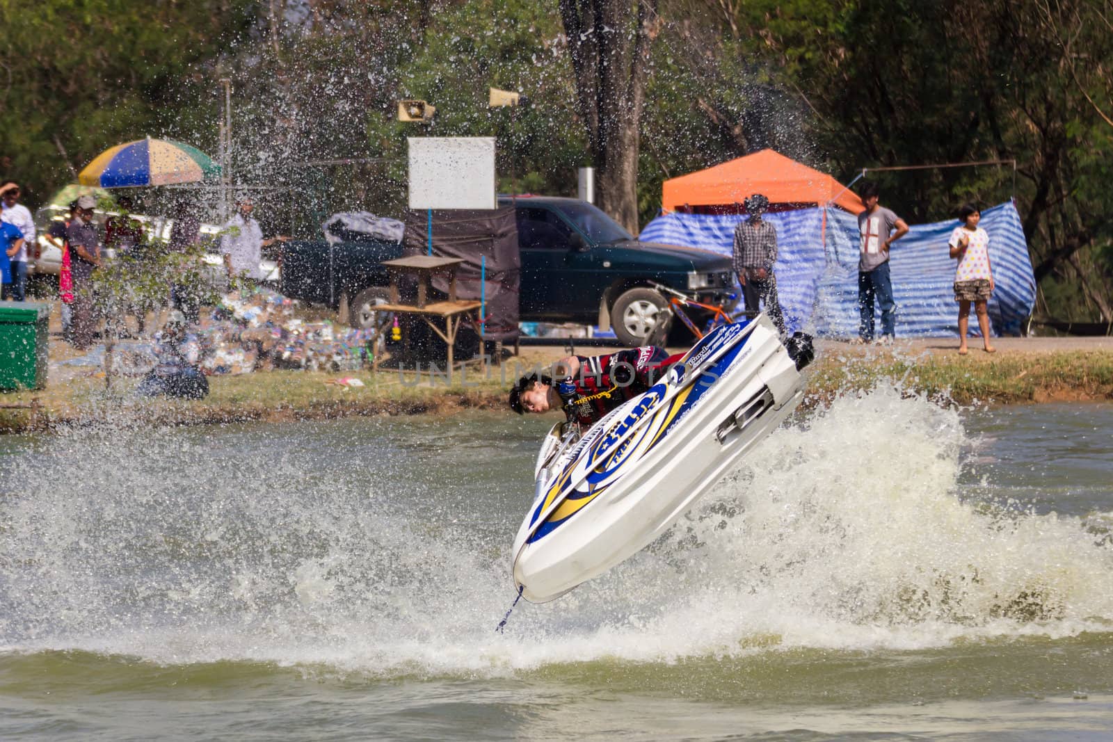 SARABURI THAILAND-JANUARY 20: Sonswut Rappasubpisan in action during show Freestyle the Jet ski  stunt action  on Jan 20, 2013 in SARABURI,Thailand.