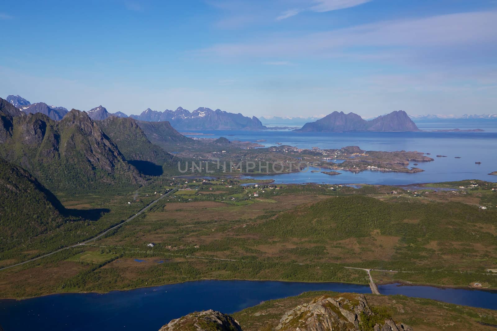View from hilltop on Lofoten islands in Norway, looking towards town of Svolvaer