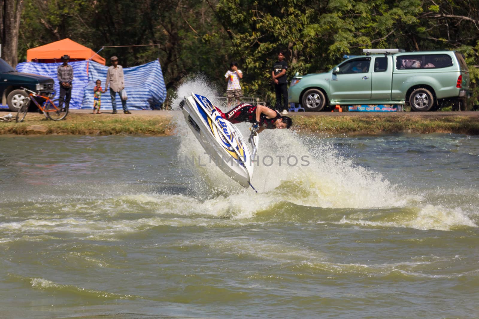 SARABURI THAILAND-JANUARY 20: Sonswut Rappasubpisan in action during show Freestyle the Jet ski  stunt action  on Jan 20, 2013 in SARABURI,Thailand.