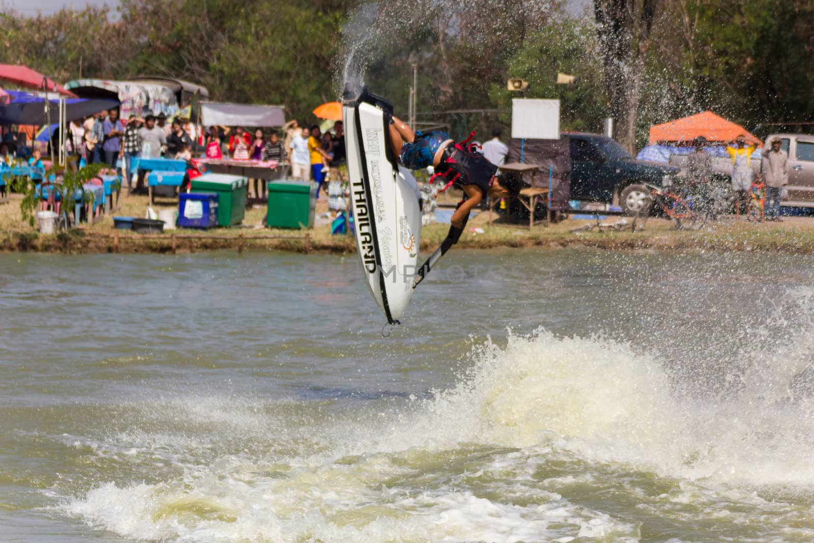 SARABURI THAILAND-JANUARY 20: Veerapong Maneechom in action during show Freestyle the Jet ski  stunt action  on Jan 20, 2013 in SARABURI,Thailand.