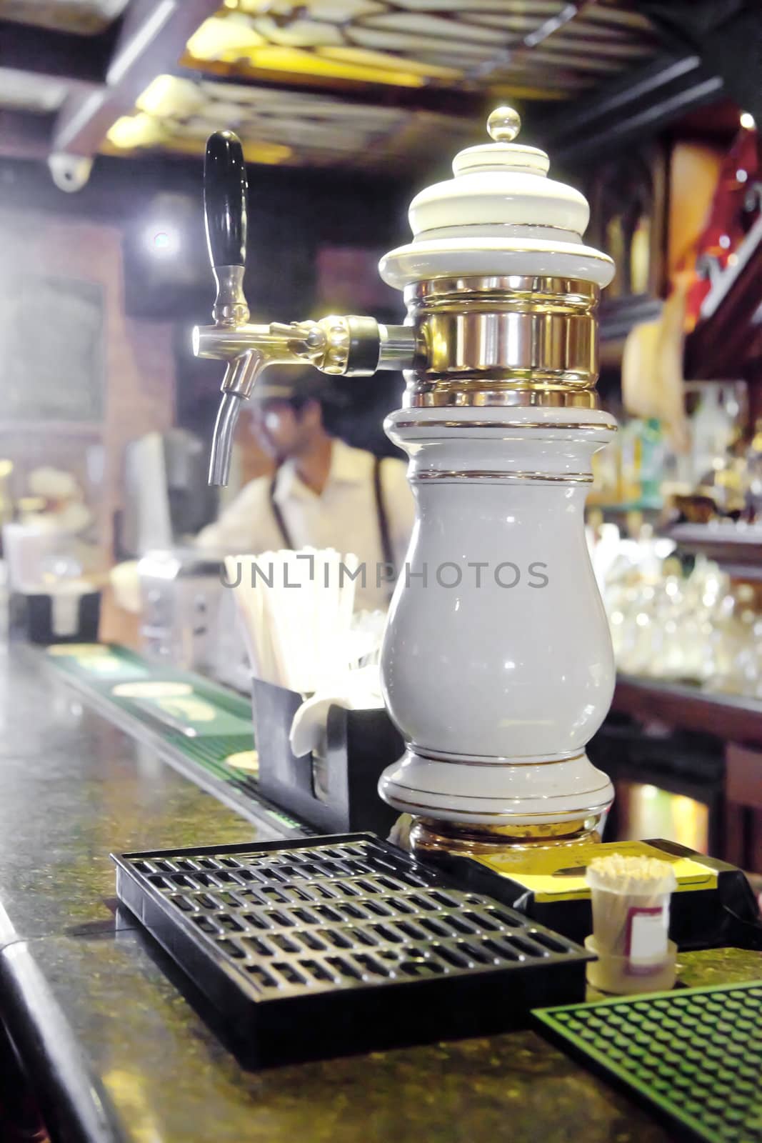 Vertical take of a beer pump, nozzle back to front to allow customers to self serve. Generic shot location India
