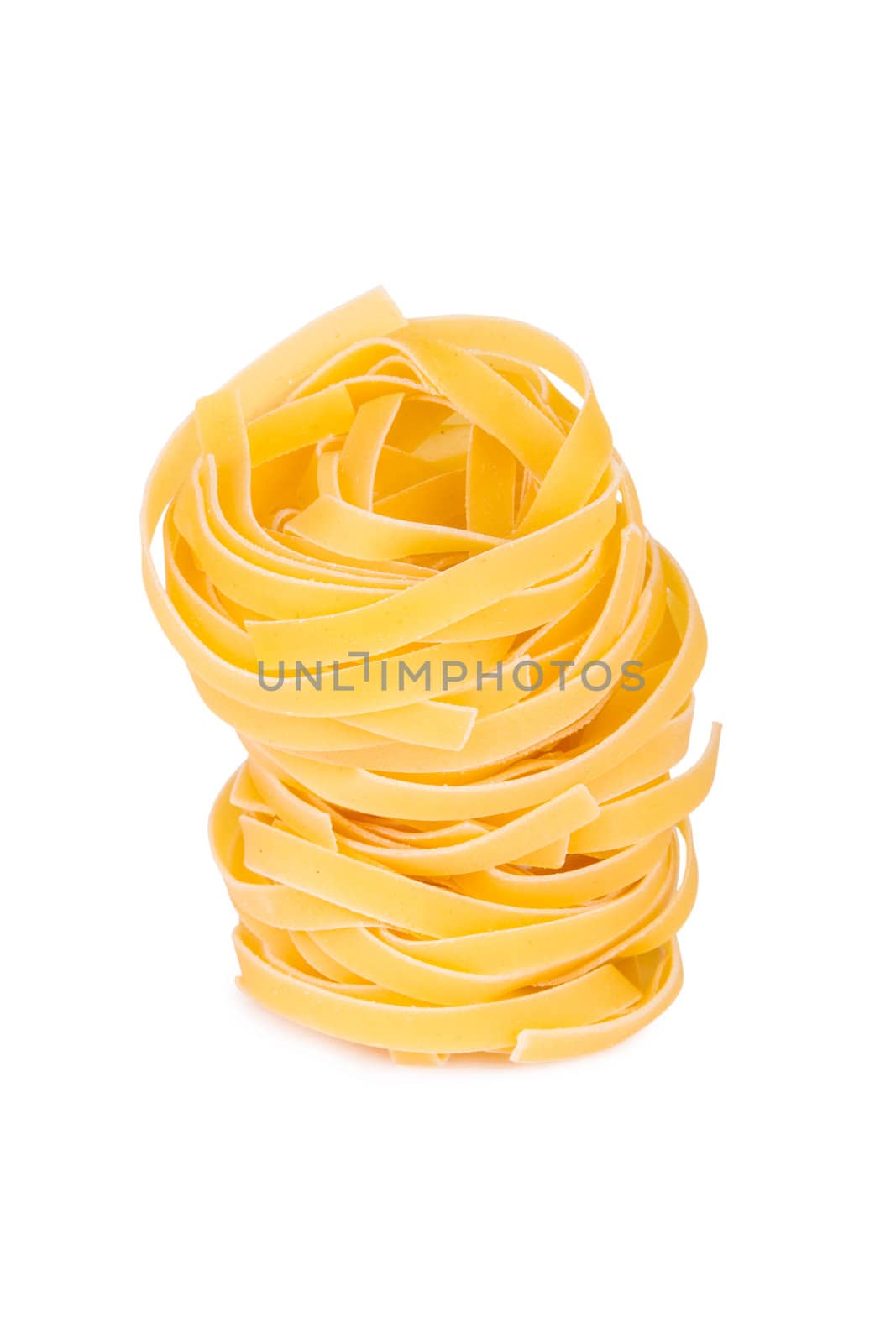 Italian pasta: tagliatelle, isolated on white background