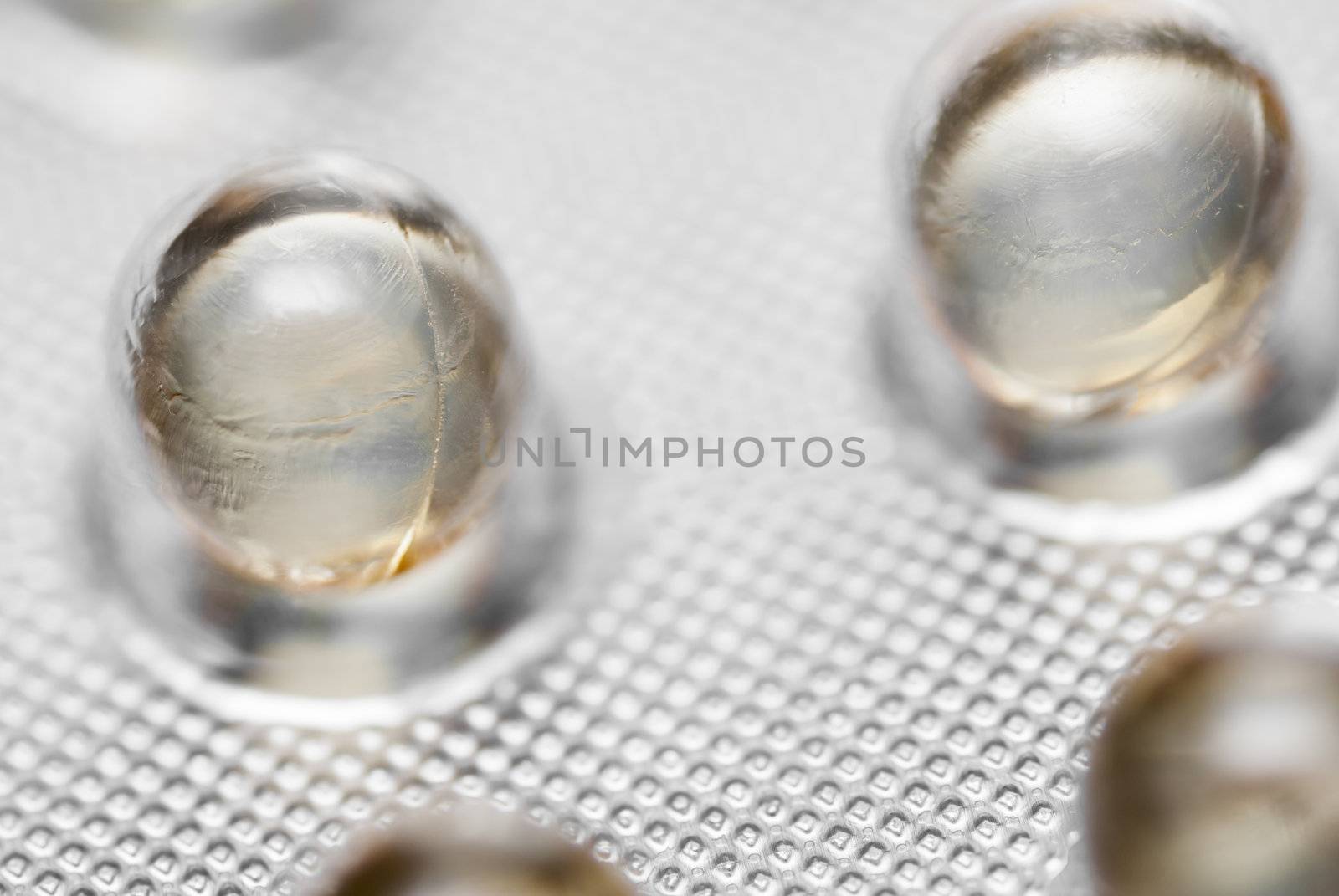 Macro photo of pills in packaging.