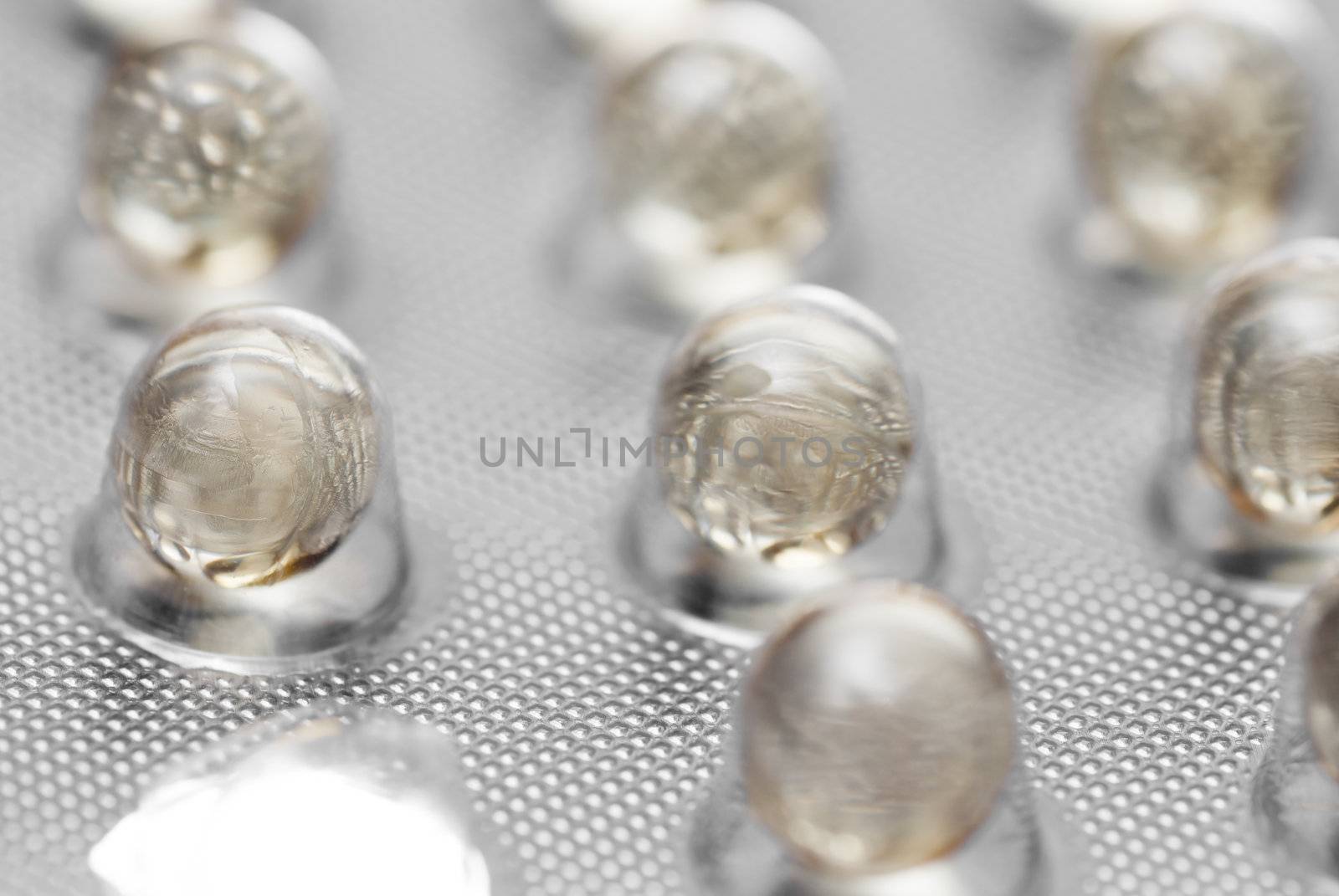 Macro photo of pills in packaging.