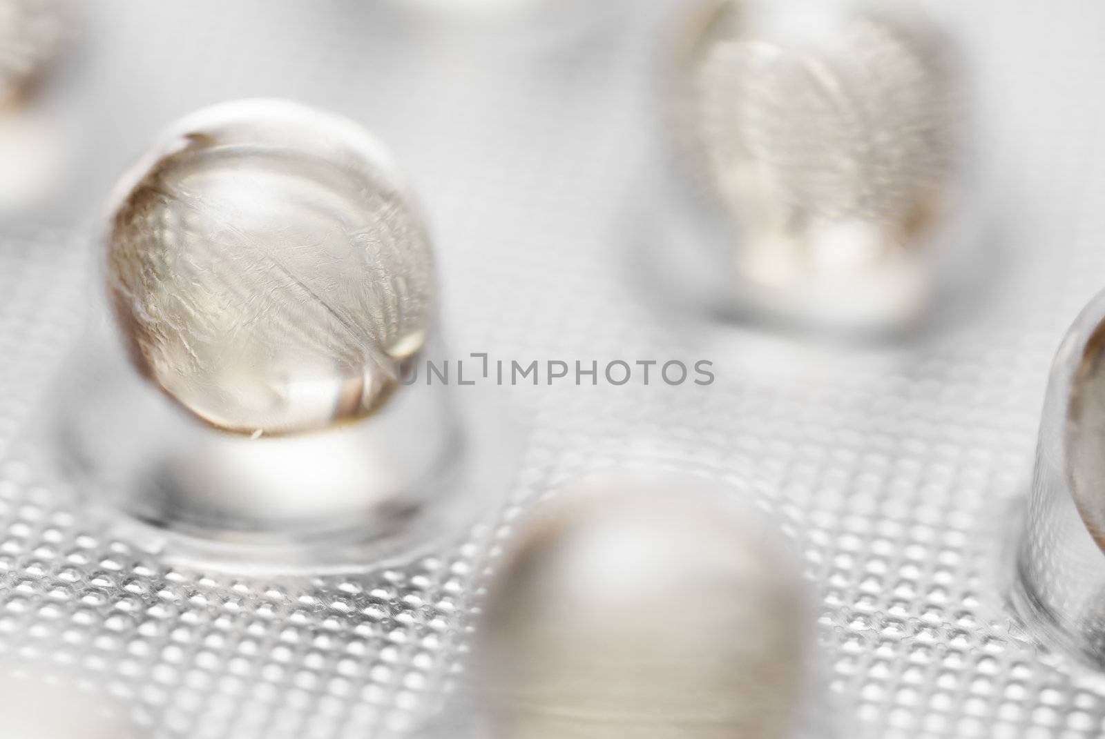 Macro photo of pills in packaging.