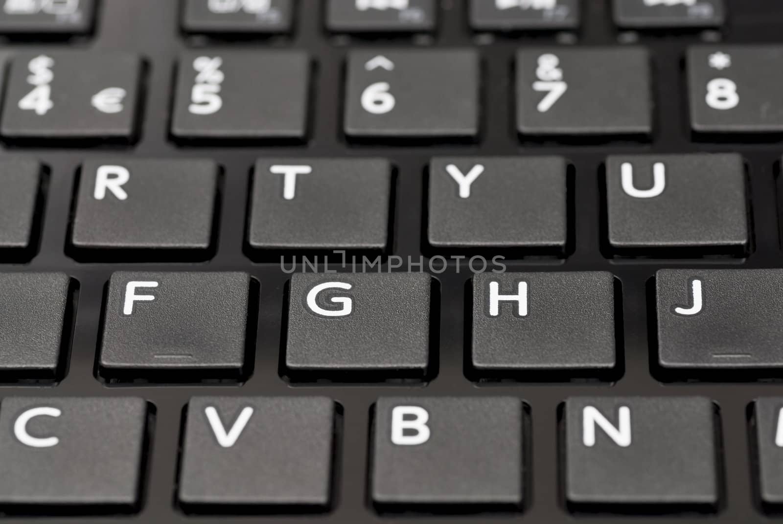 Detail of black laptop keyboard.