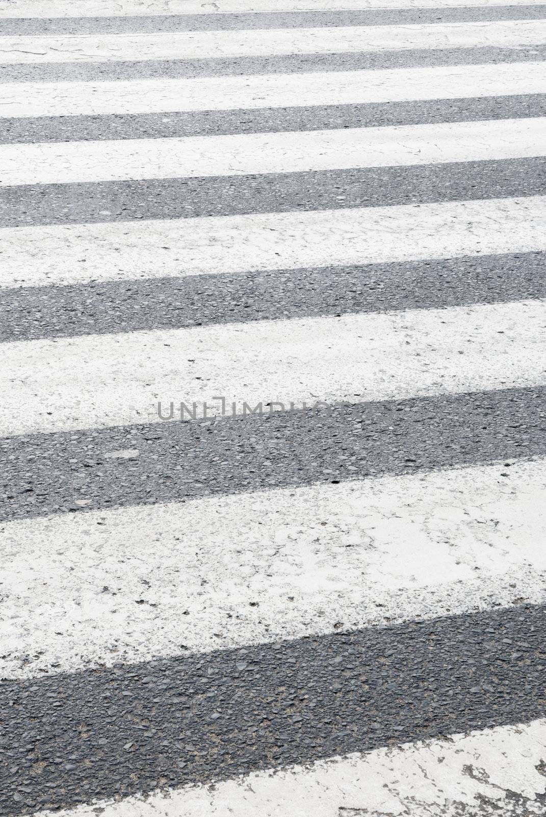 Detail of zebra crossing in a City.