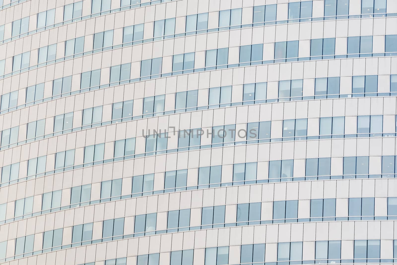 Detail of skyscraper windows in Warsaw, Poland.