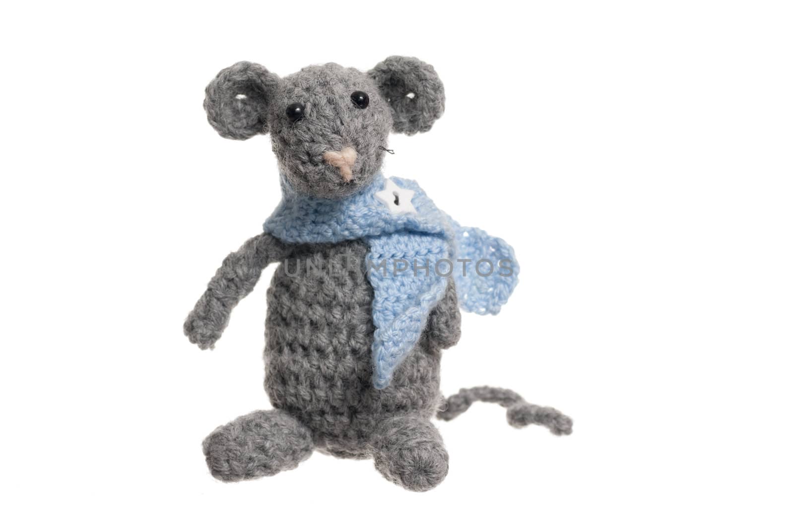 Grey handmade mouse using Crochet. Studio shot.