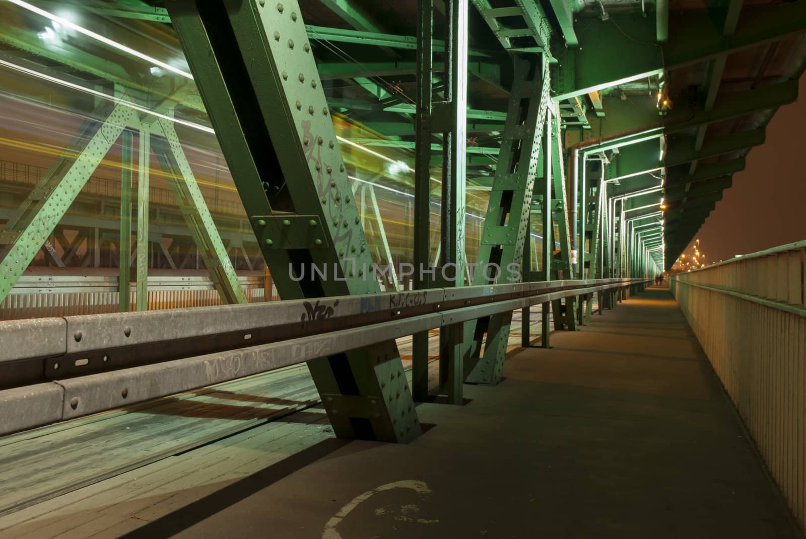 Gdanski bridge at night across Warsaw's Wisla river.