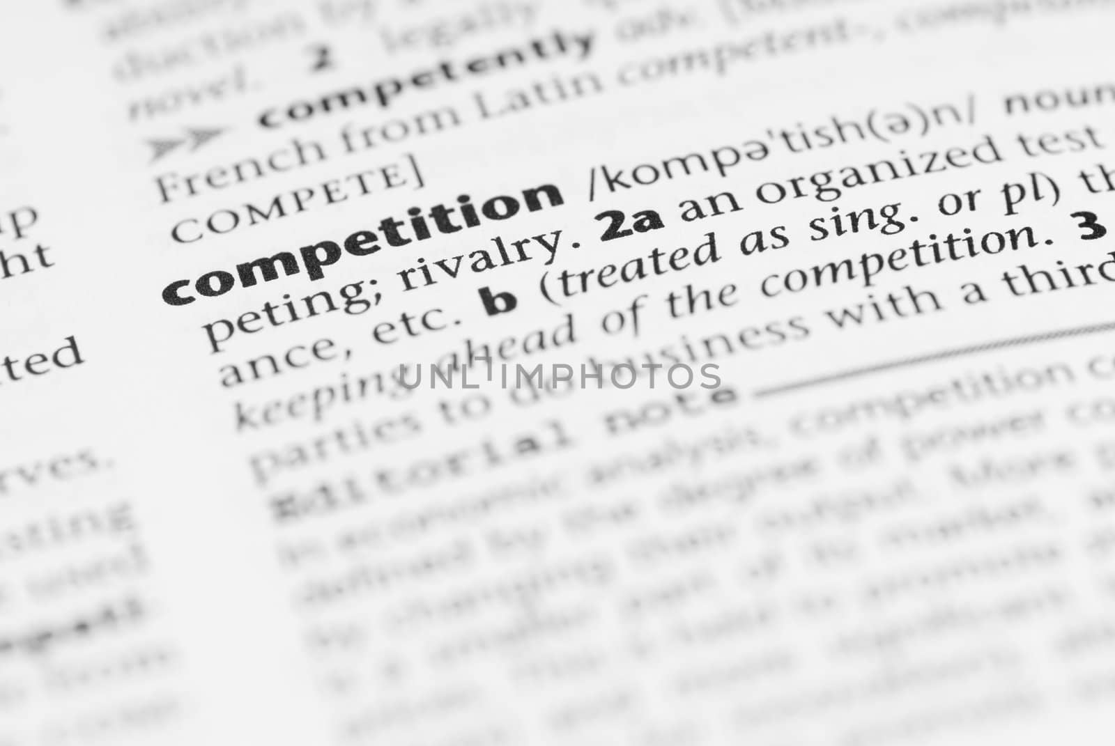 Macro image of dictionary word: Competition.