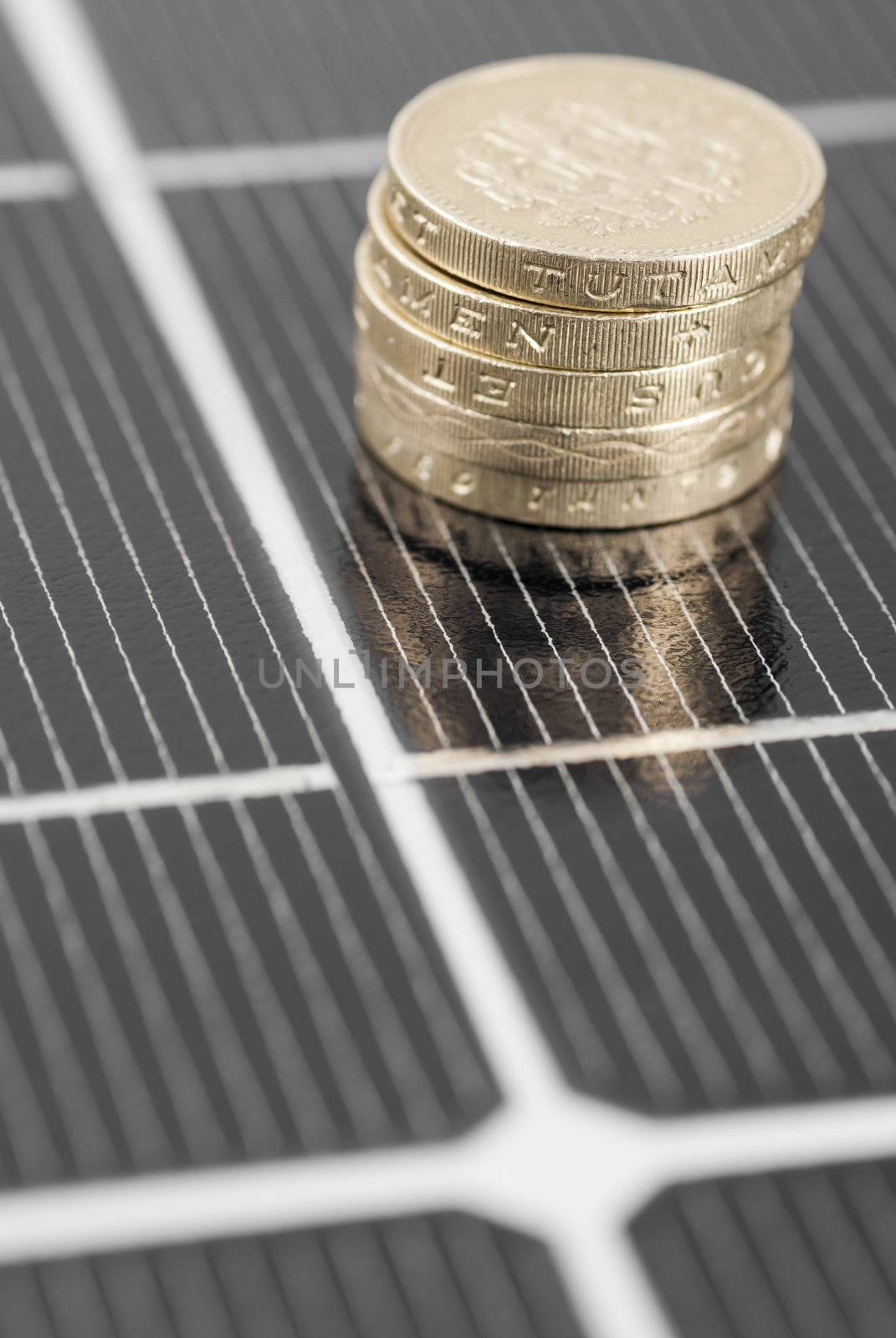 Macro image of Photovoltaic solar panel. Money ££'s.