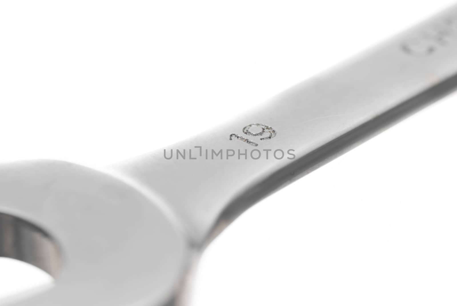 Detail of 19mm Spanner, white background.