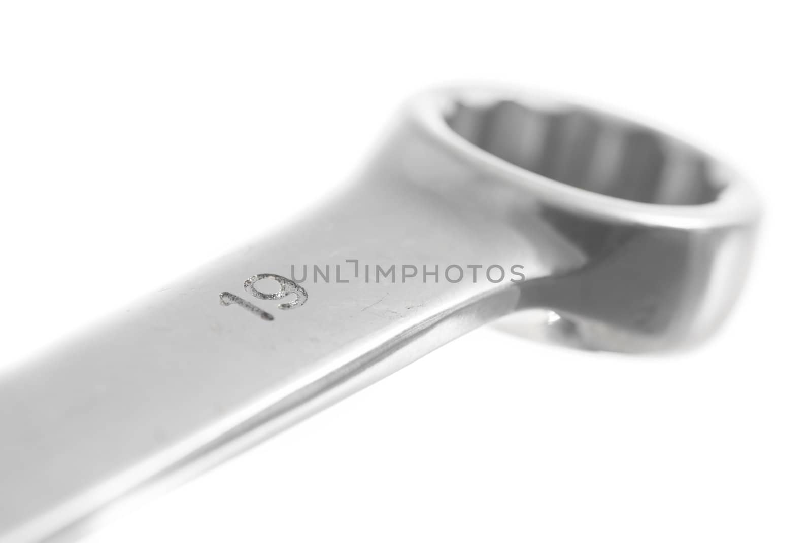 Detail of 19mm Spanner, white background.