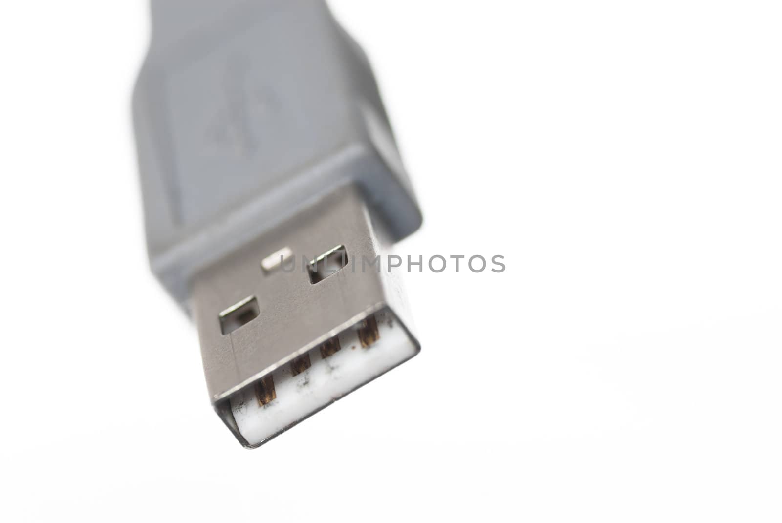 Macro image of one USB connector on white background.