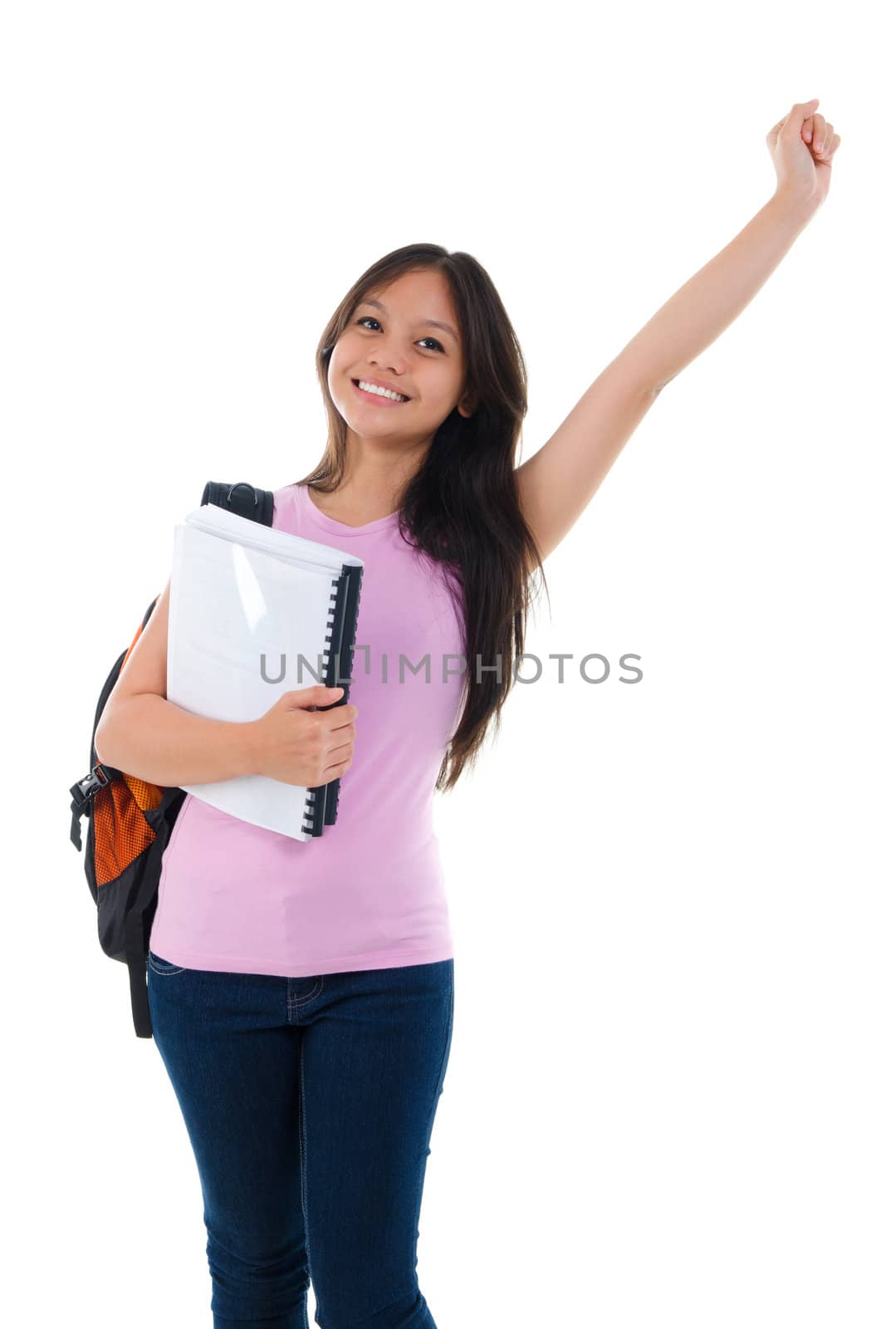 Happy Asian teen college student arm up standing on white