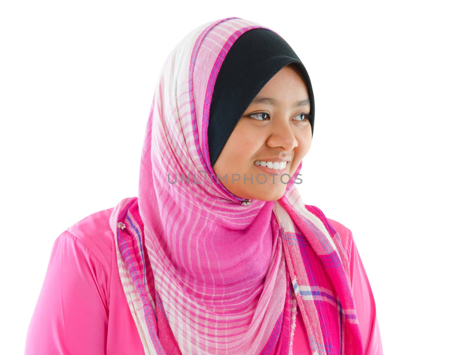 Portrait of Southeast Asian Muslim girl smiling, isolated on white background