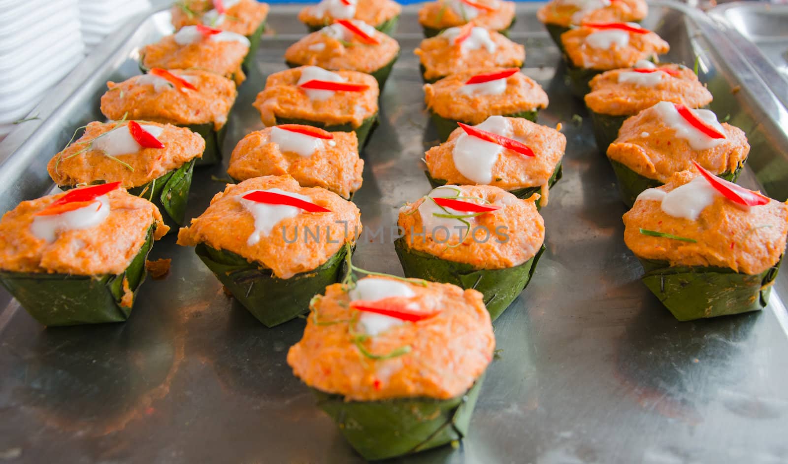 Thai food Hoh Mok Pla steamed cod fillets cooked in red curry paste and coconut