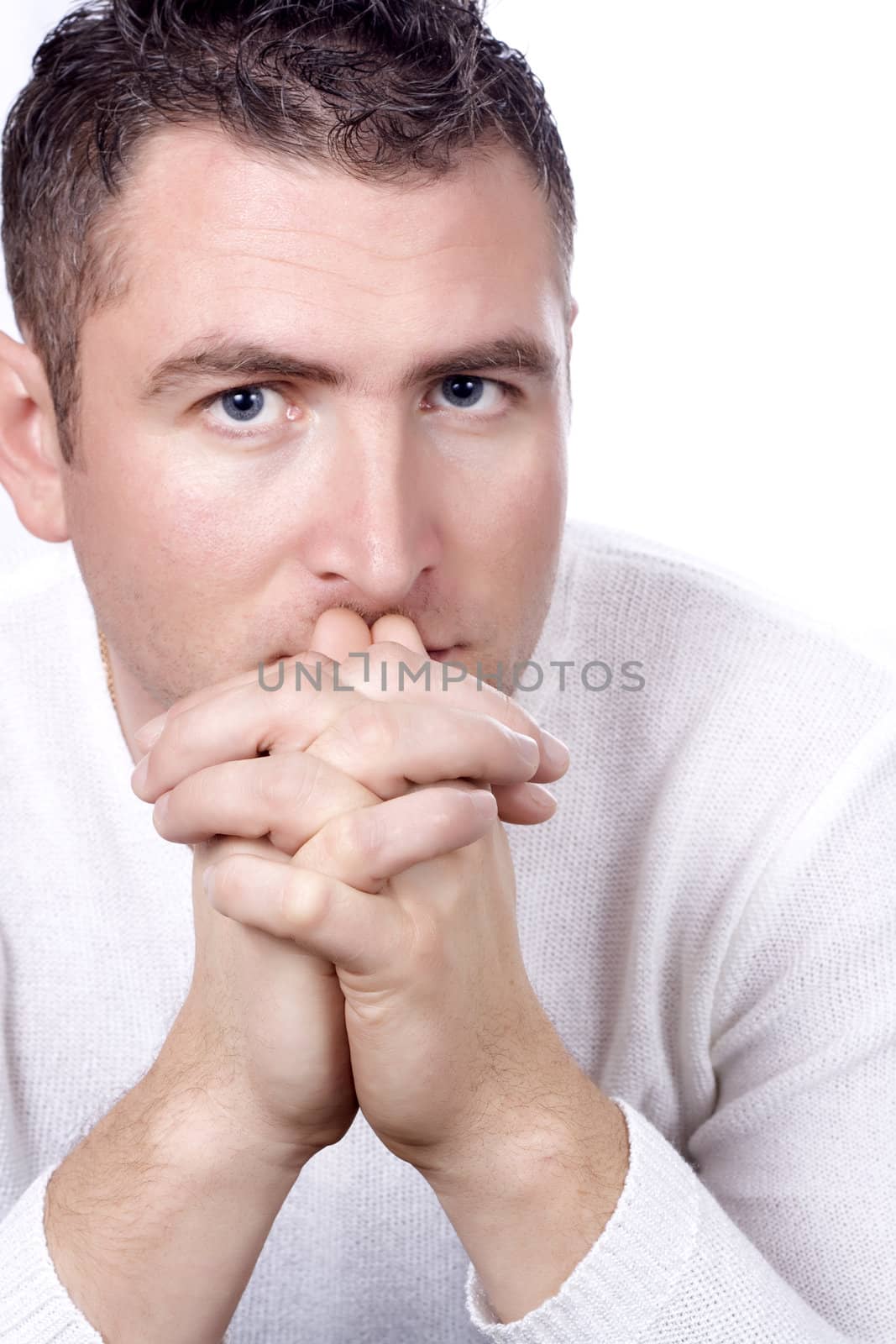 Closeup of a young man isolated in white
