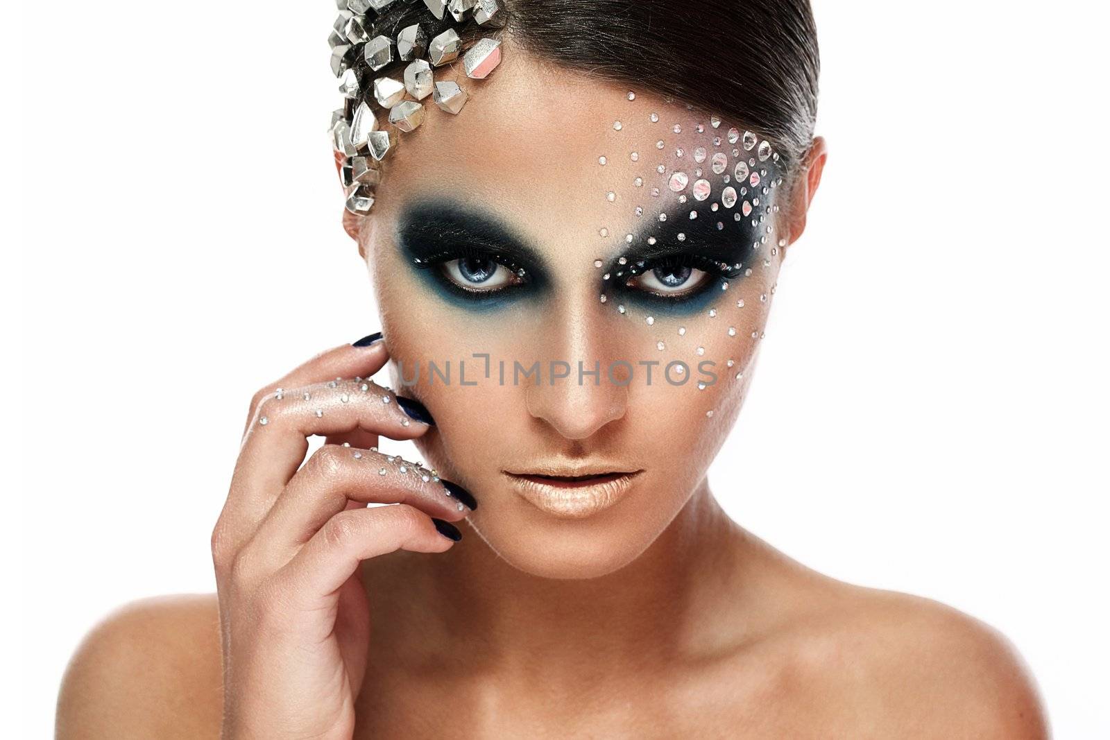 Portrait of woman with artistic make-up isolated over white background
