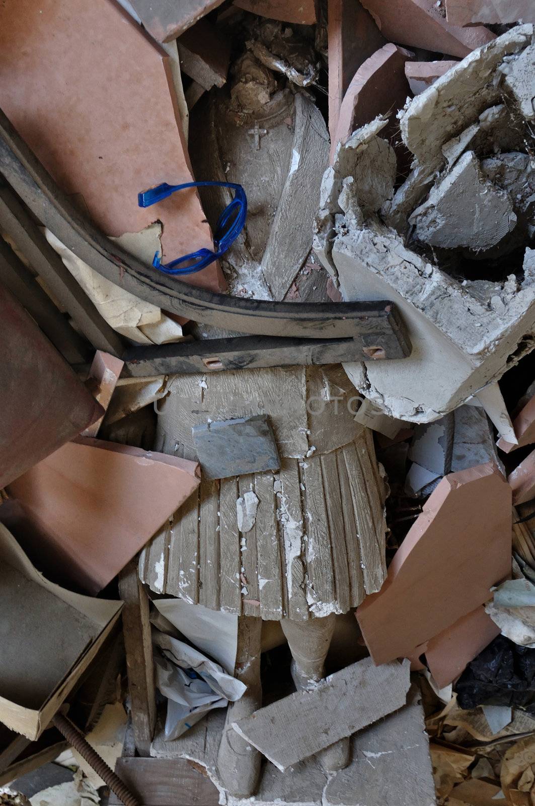 ATHENS - FEBRUARY 3: Headless statue among debris in the abandoned studio of sculptor Nikolaos Pavlopoulos in Athens Greece, February 3, 2012.