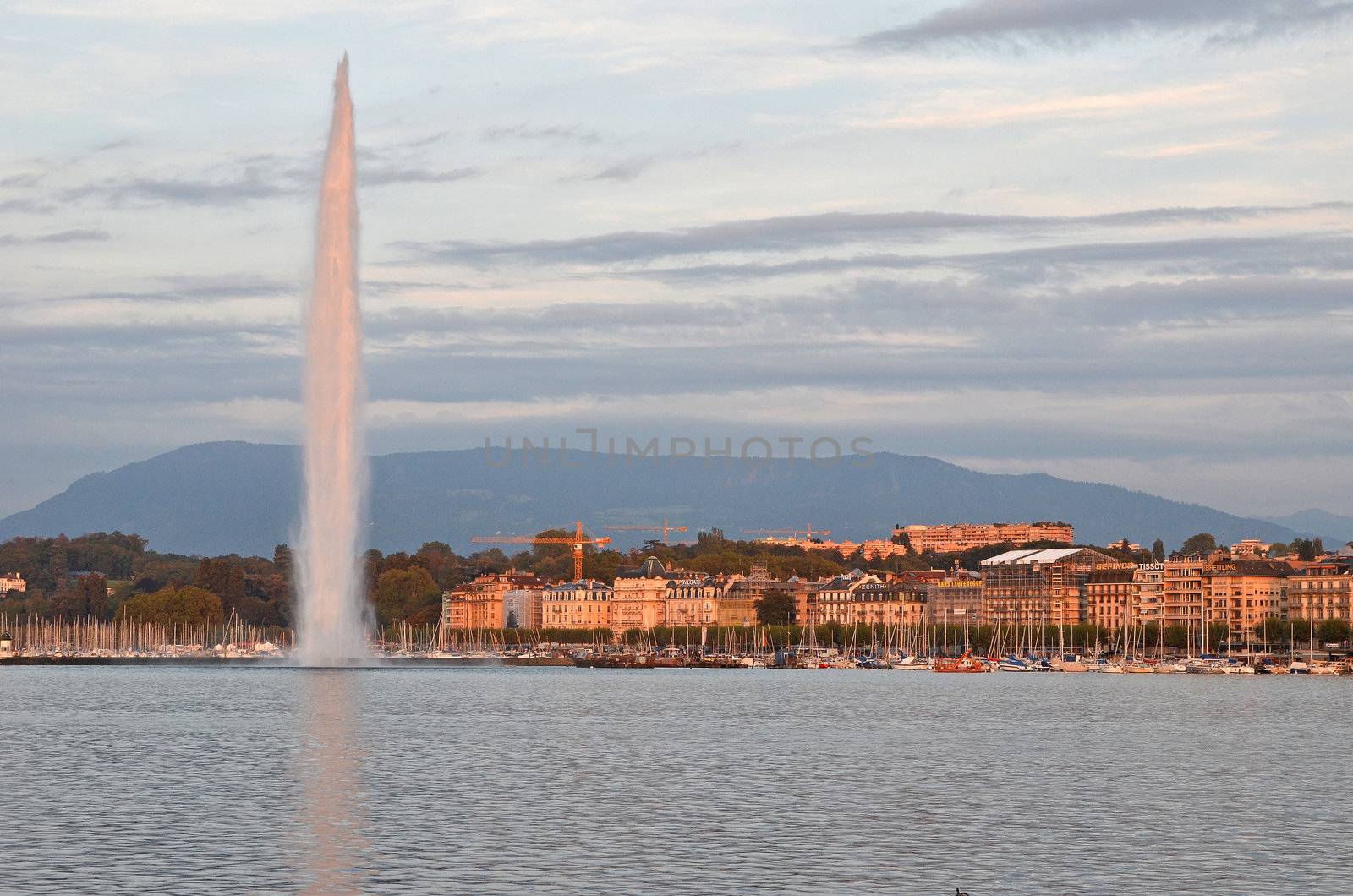View over Lake Geneva in Switzerland. To the left is the powerful jet of water 'jet d eau".