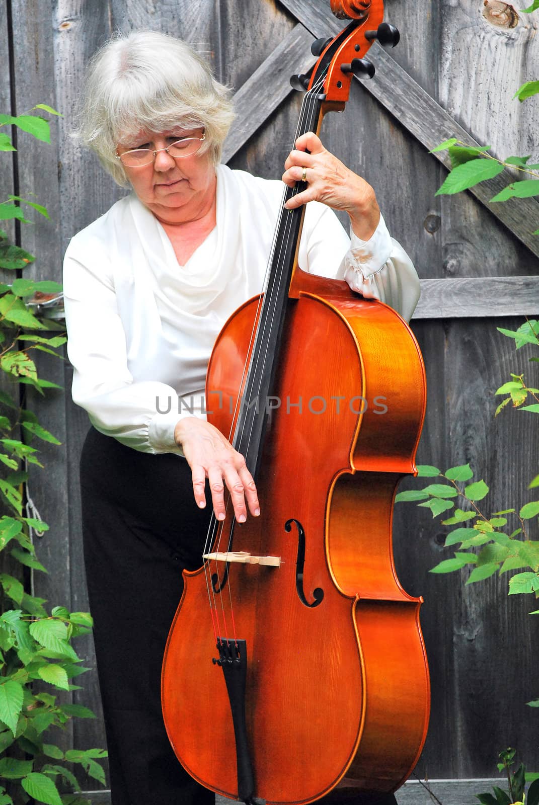 Female cellist. by oscarcwilliams