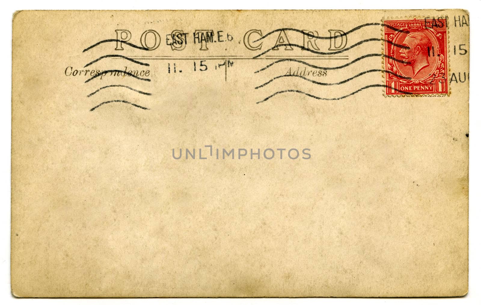 A vintage stamped postcard over a white background.