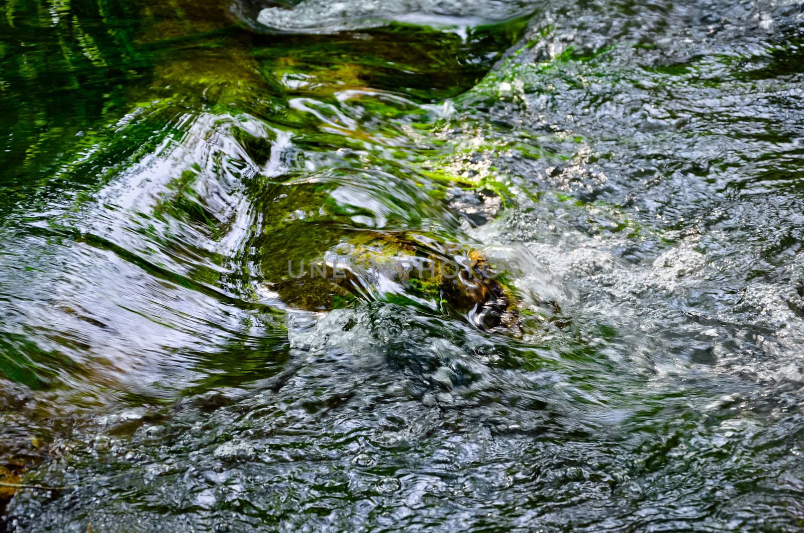 Flowing water in the mountain river in Crimea