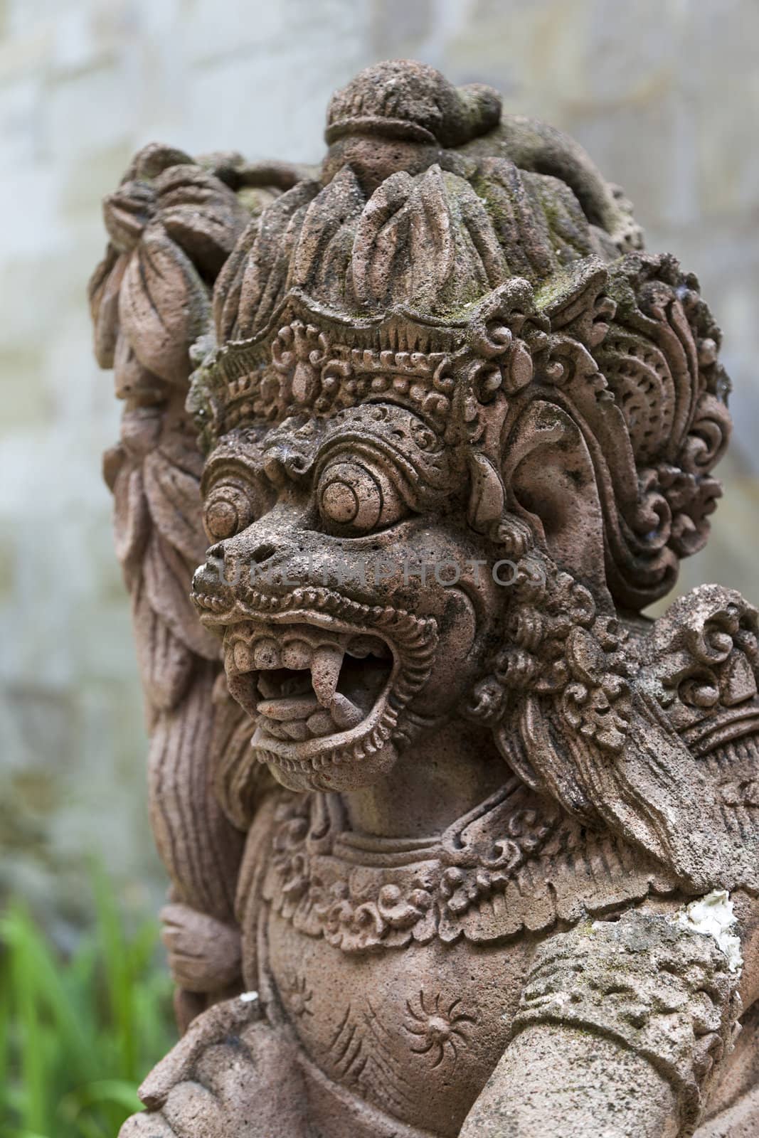 Traditional Balinese God statue in a Bali temple