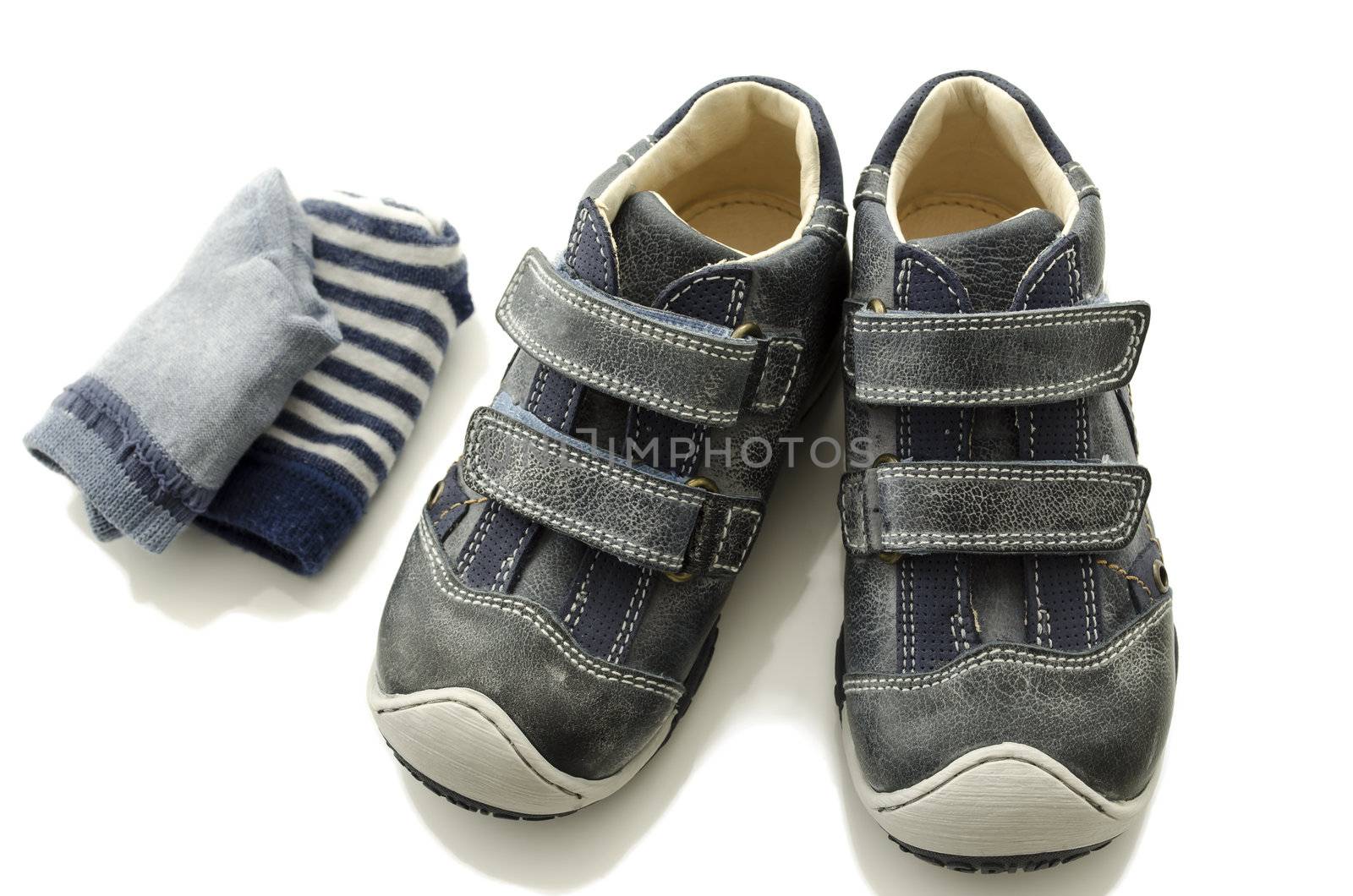 Baby boy shoes and socks isolated on a white background.