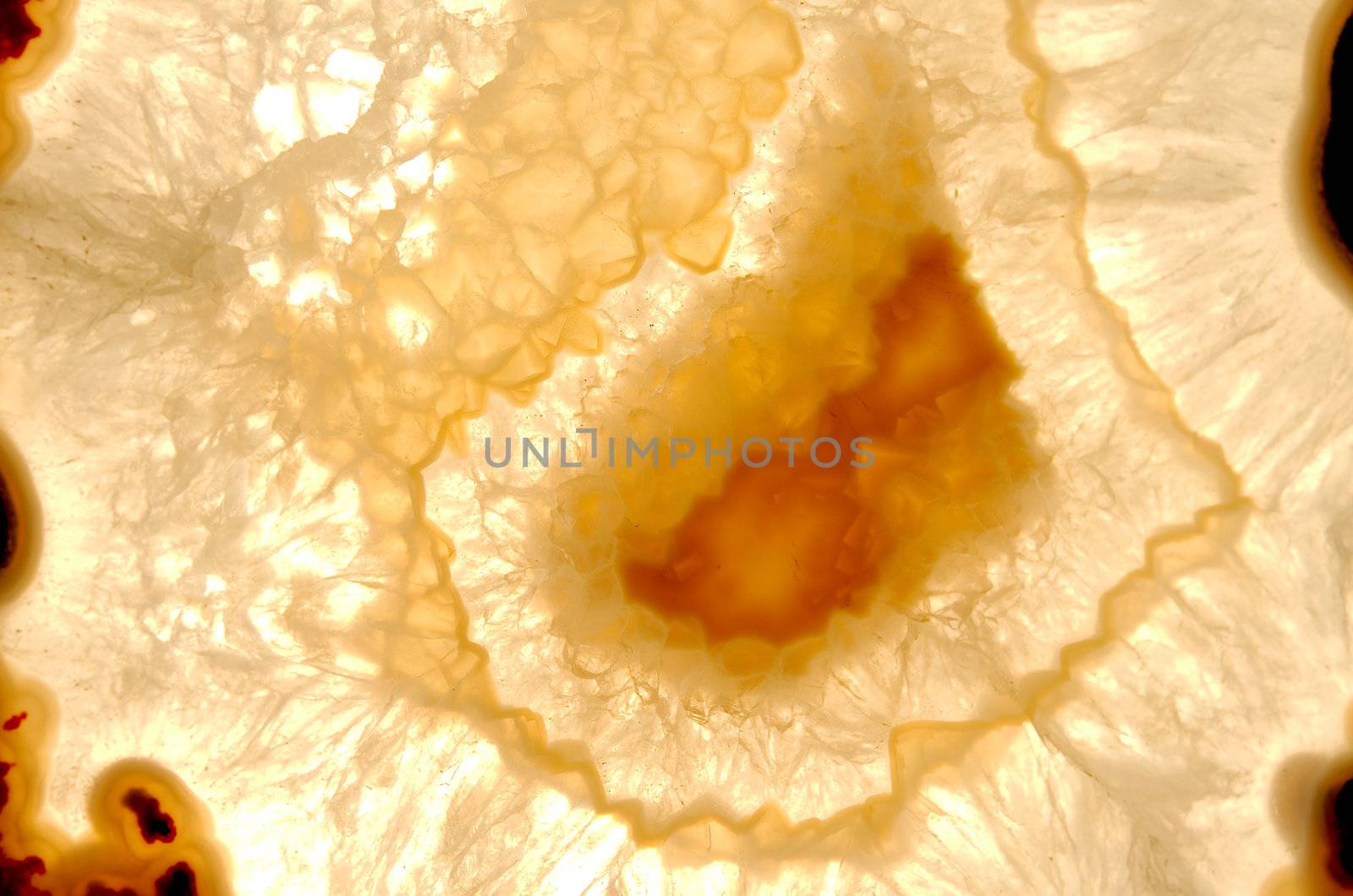 Close up of a thinly sliced backlit natural agate
