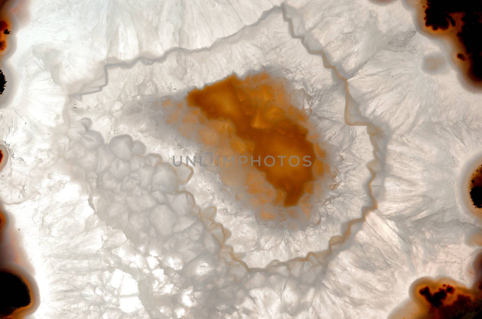 Close up of a thinly sliced backlit natural agate